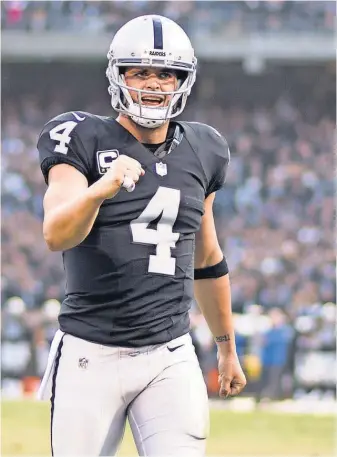  ?? KYLE TERADA, USA TODAY SPORTS ?? The Raiders’ Derek Carr has put up MVP- type numbers this season, throwing 25 touchdowns and only five intercepti­ons.