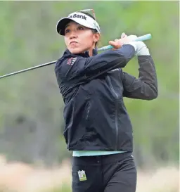  ?? LYNNE SLADKY/AP ?? Lydia Ko watches her shot from the third tee during the final round of the LPGA CME Group Tour Championsh­ip on Sunday.