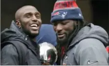  ?? THE ASSOCIATED PRESS FILE PHOTO ?? New England Patriots safety Devin McCourty, left, and running back LeGarrette Blount are among a half-dozen players that have turned down an expected invitation to the White House.