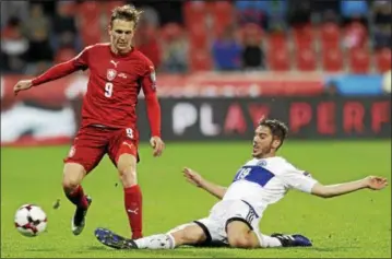  ?? PETR DAVID JOSEK — THE ASSOCIATED PRESS ?? The Czech Republic’s Borek Dockal is challenged by San Marino’s Luca Tosi during a World Cup qualifying match in 2017.