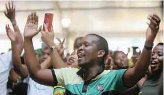  ?? Agency (ANA) MOTSHWARI MOFOKENG African News ?? ANC members sing after President Cyril Ramaphosa addressed the ANC Youth League rally at Cato Crest in Durban this week to mobilise support for the party’s launch of its election manifesto at Moses Mabhida Stadium in Durban today. |
