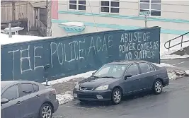  ?? ROSS BARNEY / HANDOUT / THE CANADIAN PRESS ?? Graffiti advocating for victims and against police is on a wall in St. John’s, N.L., after a police officer there was found not guilty of sexual assault by a jury last Friday.