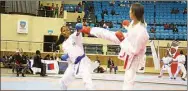  ?? PIC: PHATSIMO KAPENG ?? Flying kicks: There was no lack of action in the recent karate elections