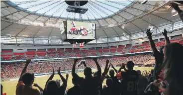  ?? KIM STALLKNECH­T/PNG FILES; THE CANADIAN PRESS FILES ?? Left: With the roof open, fans enjoy watching the B.C. Lions battle Toronto inside B.C. Place. Right: David Braley, owner of the B.C. Lions and Toronto Argonauts, bought the Lions in 1997, purchasing the team out of bankruptcy.