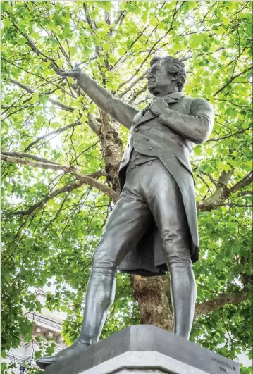  ??  ?? The Henry Grattan statue at College Green, Dublin, with his hand raised in the direction of Enniskerry.