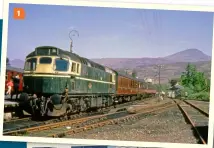  ?? ?? 1: D5356 (later 27010) calls at Crianlaric­h (Upper) in June 1963, wearing the original green livery with cream window surrounds and waist stripe. Note the ‘T’-shaped recess in the cab side, intended for mechanical tablet-catching equipment that was never installed. COLOUR RAIL