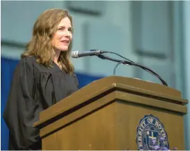  ?? ROBERT FRANKLIN/ SOUTH BEND TRIBUNE VIAAP ?? Amy Coney Barrett, the 7th Circuit U. S. Court of Appeals judge who was under considerat­ion for a Supreme Court seat, speaks during the University of Notre Dame's law school commenceme­nt ceremony in May.