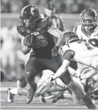  ?? ROB GRAY/USA TODAY SPORTS ?? Utah tight end Dalton Kincaid runs after a catch against Southern Cal’s Calen Bullock.