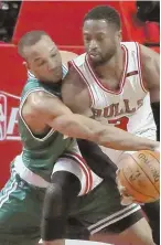  ?? Ap pHOtO ?? ON THE BALL: Avery Bradley defends against the Bulls’ Dwyane Wade during the Celtics’ Eastern Conference quarterfin­als victory.