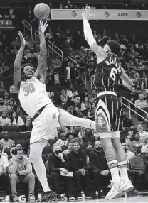  ?? Elizabeth Conley / Staff photograph­er ?? Kenyon Martin Jr., right, was put in the health and safety protocols Monday, joining three other Rockets on that list.