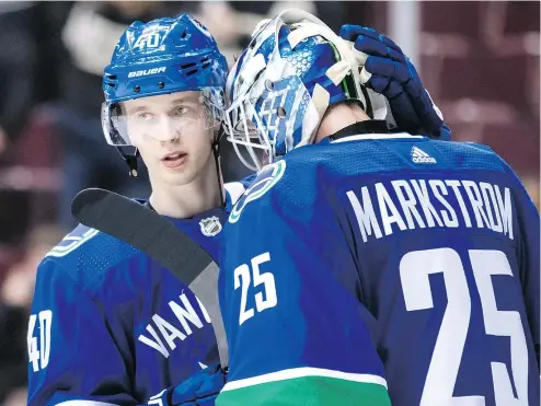  ?? — THE CANADIAN PRESS FILES ?? Canucks’ Elias Pettersson, left, says his favourite NHL game to date was a 7-6 thriller against the Avalanche on Nov. 2. Goalie Jacob Markstrom, who got the win in that one but let in six goals, might disagree.