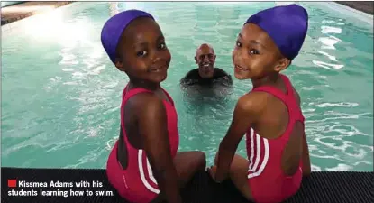  ??  ?? Kissmea Adams with his students learning how to swim.