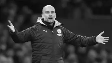  ??  ?? Pep Guardiola heeft een aflopend contract bij Manchester City, maar de trainer denkt nog niet aan zijn toekomst en wil ook nog niets kwijt. (Foto: AD)