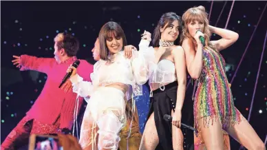  ??  ?? Charli XCX, left, Camila Cabello and Taylor Swift perform on the opening night of Swift’s 2018 Reputation Stadium Tour in suburban Phoenix. Tickets to her shows can cost hundreds of dollars.