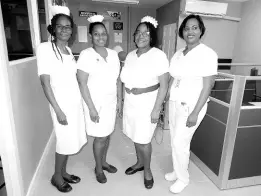  ?? ?? Four of the managers occupying the new space pose for a photo in their new surroundin­gs. From left are Carmen Johnson, director of nursing; Anastasia Rose, deputy director of nursing; Murlene Campbell-Taylor, acting department nurse manager, and Michelle Hall, department nurse manager.