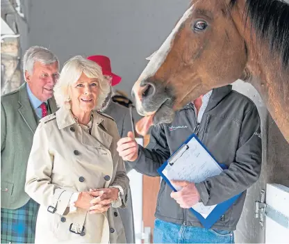  ?? Picture: PA. ?? Camilla meets founder Jock Hutchison with Brook the horse at HorseBack UK, Aboyne.