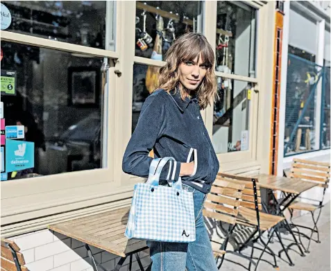  ??  ?? Boss lady: ahead of Small Business Saturday, Alexa Chung prepares to release her own It bag, above, from her own fashion brand