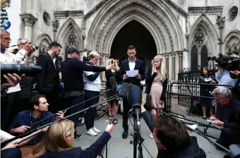  ?? Reuters and AP ?? Charlie Gard’s parents, Connie Yates and Chris Gard, at the high court in London after a hearing on their baby’s future. The boy was taken off life-support and he died on Friday