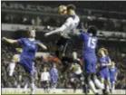  ?? THE ASSOCIATED PRESS ?? Tottenham’s Dele Alli, center, scores one of his two goals in a 2-0victory over Chelsea.