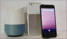  ?? ASSOCIATED PRESS ?? The new Google Pixel phone is displayed next to a Google Home smart speaker, left, following a product event in San Francisco.