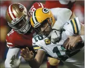  ?? NHAT V. MEYER — BAY AREA NEWS GROUP ?? The 49ers’ Arik Armstead sacks Green Bay Packers starting quarterbac­k Aaron Rodgers during a game in November.