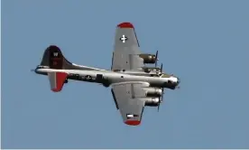  ?? Photograph: Ted S Warren/AP ?? A second world war-era Boeing B-17 Flying Fortress airplane banks in the air as it comes in for a landing in 2016.