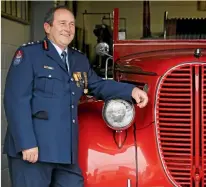  ?? BRUCE MERCER / FAIRFAX ?? Don Gerrand has been a volunteer at Cambridge Fire Station, left, for 48 years.