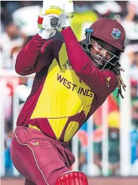  ?? KAMRAN JEBREILI THE ASSOCIATED PRESS ?? West Indies batsman Chris Gayle, arguably the most fearsome batter in the history of T20 cricket, took unkindly to the mere suggestion he wasn’t an automatic selection for the starting 11.