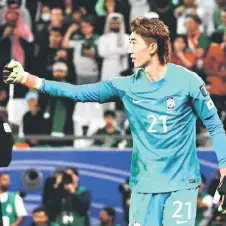  ?? — AFP photo ?? Jo Hyeon-woo gestures to his teammates during the AFC Asian Cup match between Saudi Arabia and South Korea at Education City Stadium in alRayyan, west of Doha.