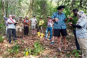  ??  ?? ‘malaya at War’ conference tour members visiting the Green ridge, the historical site of the battle of Kampar.