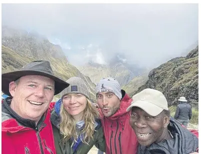  ?? ?? Ambrose, right, with model Jodie Kidd and pals on charity track in Peru