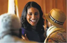  ?? Scott Strazzante / The Chronicle ?? San Francisco Mayor London Breed greets the public in the receiving line after Breed’s inaugurati­on at City Hall.