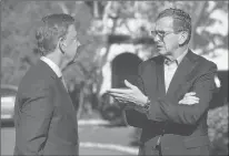  ?? JESSICA HILL | ASSOCIATED PRESS ?? GOV. DANNEL P. MALLOY, right, talks with Gov.-elect Ned Lamont Thursday at the governor’s residence, where Lamont and his wife, Annie Lamont, lunched with the governor and first lady.
