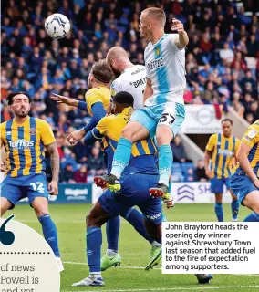  ?? ?? John Brayford heads the opening day winner against Shrewsbury Town last season that added fuel to the fire of expectatio­n among supporters.