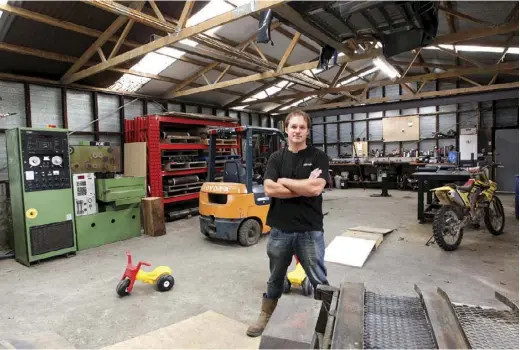  ??  ?? Above: Mark Horwell and his Taranaki workshop Far left: The control panel for the EDMLeft: The EDM cuts hightensil­e steel with electrical pulsesBelo­w: Mark’s rural shed, where it all happens