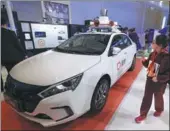  ?? CHENG GONG / CHINA DAILY ?? An autonomous driving car,