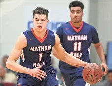  ?? GREGORY PAYAN, AP ?? If Michael Porter Jr. (1) and Nathan Hale win their state title, the team can play in the High School Nationals.