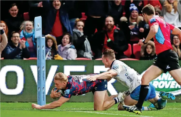  ?? ?? Toby Fricker dives over to score the second of his two tries in Bristol’s win against Worcester at Ashton Gate