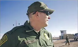  ?? Brian Bennett Los Angeles Times ?? MARK MORGAN tours a Border Patrol training facility in El Paso. He is the first outsider to lead the agency, which has prompted challenges from within.