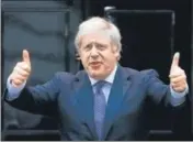  ?? AP ?? Boris Johnson gestures to the media outside 10 Downing St.