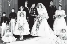  ??  ?? Prince Charles and Diana, Princess of Wales, in the Throne Room of Buckingham Palace. Back row, left to right: Edward van Cutsem, Lord Nicholas Windsor, Sarah Jane Gaselee, Prince Edward, Prince Charles, The Princess of Wales, Prince Andrew and Lady...