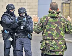  ??  ?? Armed officers from Police Scotland take part in a demonstrat­ion of how they would respond to a threat to the safety of the public or VIPS at Cop26 in Glasgow