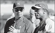  ?? AP file photo ?? Rickey Henderson (right) did everything he could as a kid to get the autograph of his hero, Reggie Jackson (left), even sneaking into Oakland Coliseum.