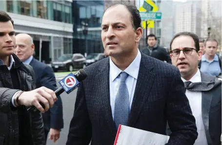  ?? JONATHAN WIGGS/BOSTON GLOBE VIA THE ASSOCIATED PRESS ?? B.C. businessma­n David Sidoo, centre, leaves court in Boston on March 15 after pleading not guilty to conspiracy to commit fraud in U.S. college admissions. Canada must smarten up and close all loopholes, writes Diane Francis.