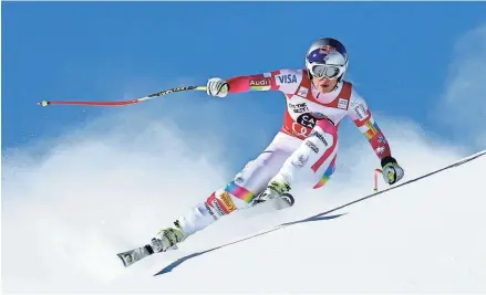  ??  ?? Lindsey Vonn speeds down the course during a World Cup downhill in 2015 in St. Moritz, Switzerlan­d. Vonn is planning to compete in her last race Sunday. MARCO TROVATI/AP