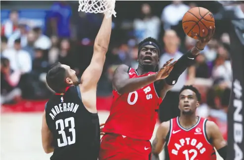  ?? Takashi Aoyama / Gett y Imag es ?? Terence Davis of the Toronto Raptors was a star football player but chose to play his first love — basketball — to the chagrin of many. “I would just say that the doubters and people like that, it really motivates guys like me,” he says.