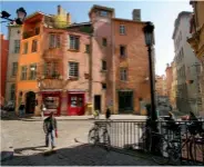  ??  ?? From left: The pink tarte praline was invented by an 18th-century Lyonnais pastry chef, who was inspired by the rose gardens in the Rhône region; Place de la Trinité is a square located in the 5th arrondisse­ment of Lyon.