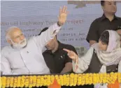  ?? — PTI ?? Prime Minister Narendra Modi with J&K chief minister Mehbooba Mufti during a public rally in Udhampur, Jammu, on Sunday.