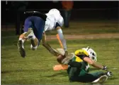  ??  ?? Strathmore High School's Nick Salas scores a touchdown in the second overtime.