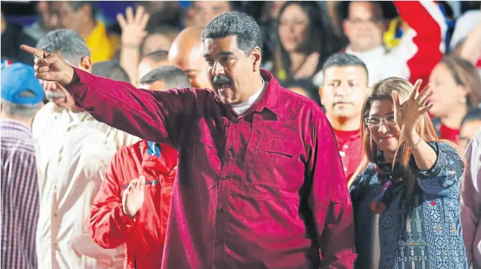  ?? Ap ?? Tras el anuncio de los resultados, Maduro saludó a sus seguidores en el Palacio de Miraflores